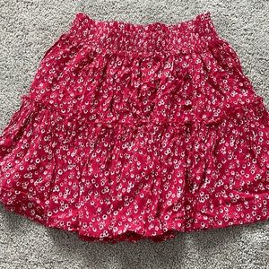 red skirt with flowers